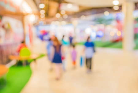 blur image of shopping mall with people for background usage.の写真素材