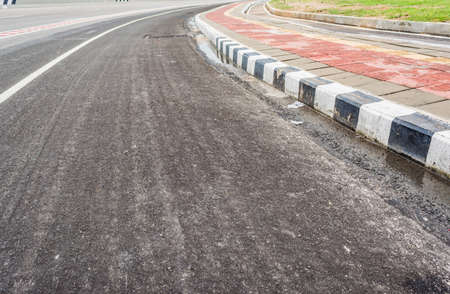 image of asphalt road and new bike lane with sign for background usage.の写真素材