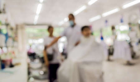 blur image of people at haircut shop for background usage.の写真素材