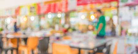 blur image of coffee shop with bokeh for background usage .の写真素材