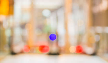 blur image of escalators at the modern shopping mall for background usage.の写真素材