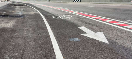 image of asphalt road and new bike lane with sign for background usage.