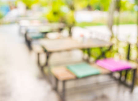 blur image of coffee shop with bokeh on day time for background usage.の写真素材