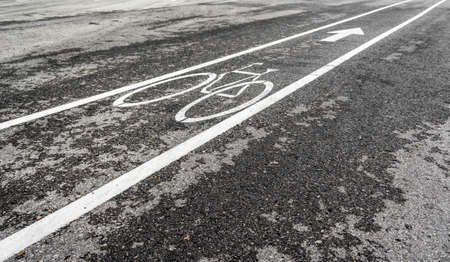image of asphalt road and new bike lane with sign for background usage.