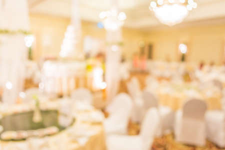 blur image of wedding party  in large hall for background usage.の写真素材