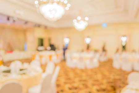 blur image of wedding party  in large hall for background usage.の写真素材