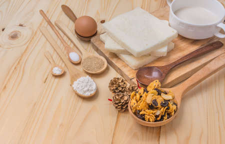 image of different sweet bread ingredient , cereal and equipment   on wood table.