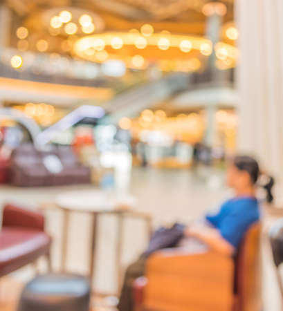 blur image of coffee shop and people  with bokeh for background usage.の写真素材