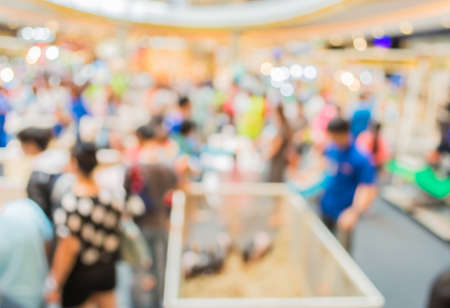 image of blur people at pet show in hall for background usage .の写真素材