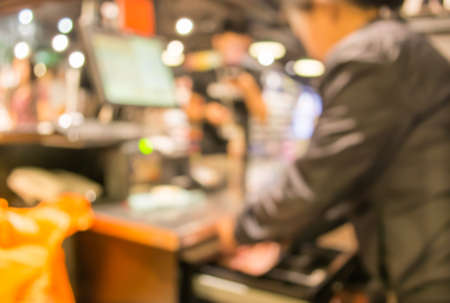 blurred image of shopping mall and people for background usage .の写真素材