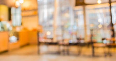 Coffee shop blur background with bokeh image.の写真素材