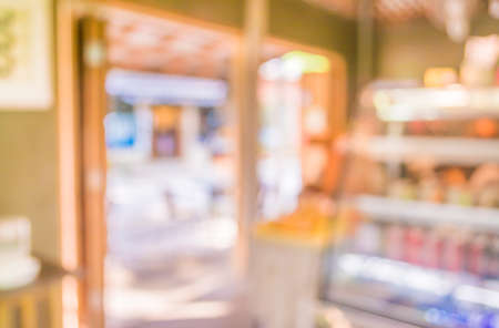 blur image of coffee shop with bokeh on day time for background usage.の写真素材