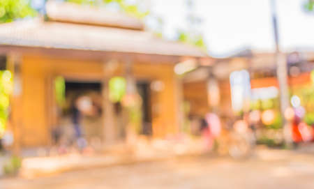 blur image of coffee shop with bokeh on day time for background usage.の写真素材