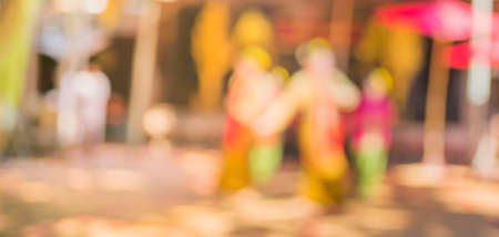 blur image of thai traditional dancing in north style clothes for background usage.の写真素材