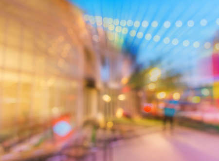 Artistic style - Defocused night street abstract texture ,blurred background with bokeh of  city on street at night.の写真素材