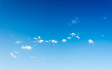 image of blue sky white clouds on day time for background usage.の写真素材