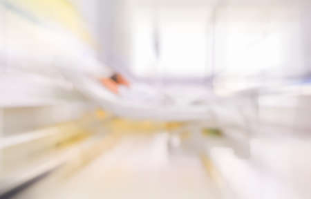 blurred image of Patient with drip in hospital for background usage.の写真素材