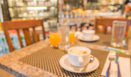 coffee shop blur background with bokeh image.の写真素材