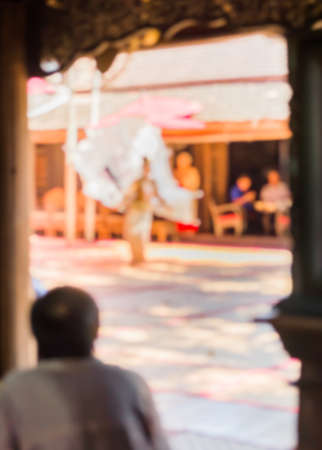 blur image of thai traditional dancing in north style clothes for background usage.の写真素材