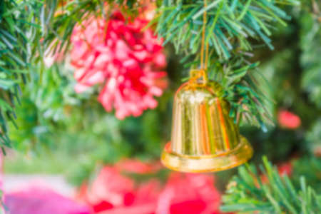 blur image of Christmas tree and ornament in background on day time.の写真素材