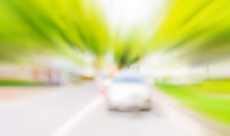 blur image of car and tree in background .の写真素材