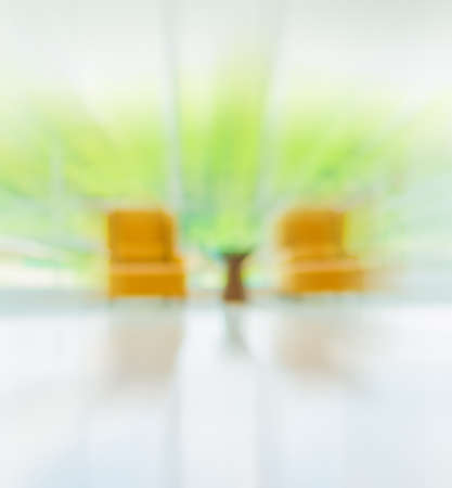 blur image of hospital office room with table and chairs for background usage.の写真素材