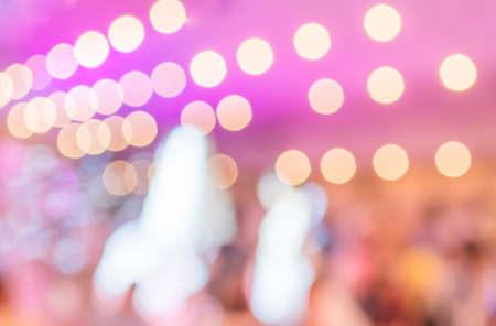 blur image of many people at  wedding ceremony in large hall.の写真素材