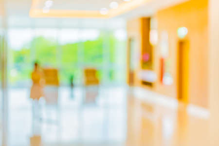 blur image of hospital office room with table and chairs for background usage.の写真素材