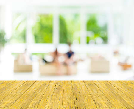 Empty wood table and Coffee shop blur background with bokeh image.の写真素材