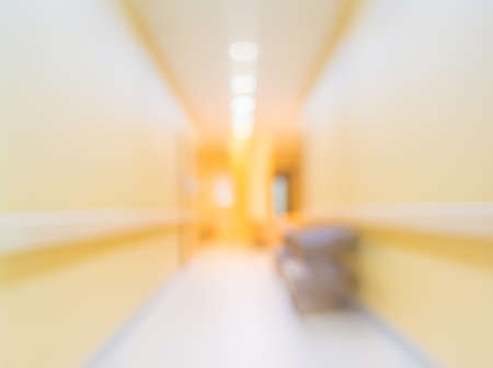blur image of corridor and light at destination for background usage.の写真素材