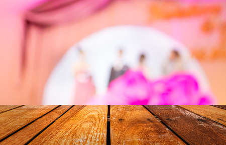 blur image of Thai wedding on purple stage with red carpet for background usage.の写真素材