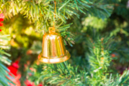 blur image of Christmas tree and ornament in background on day time.の写真素材