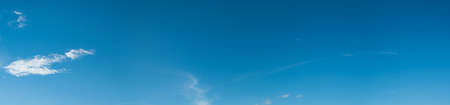 panorama shot image of clear blue sky on day time for background usage(horizontal).の写真素材