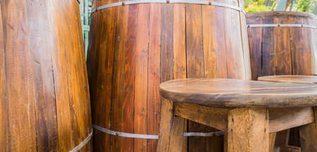 image of empty barrels and chair for background usage.