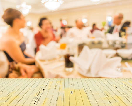 blur image of wedding party  in large hall for background usage.の写真素材