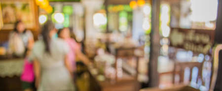 image of blurred bakery shelf in coffee shop for background usage .
