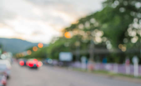 image of blur car on road in evening for background usage .の写真素材