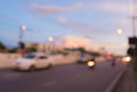 image of blur car on road in evening for background usage .の写真素材