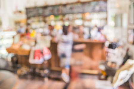 Coffee shop  counter blur background with bokeh image .の写真素材