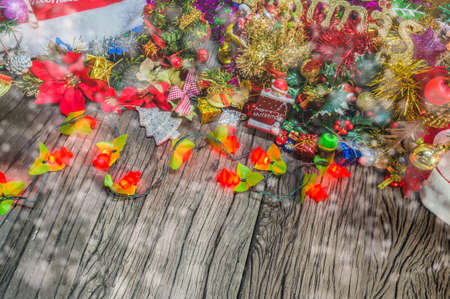 christmas ornaments and vary of decoration on wood background.の写真素材