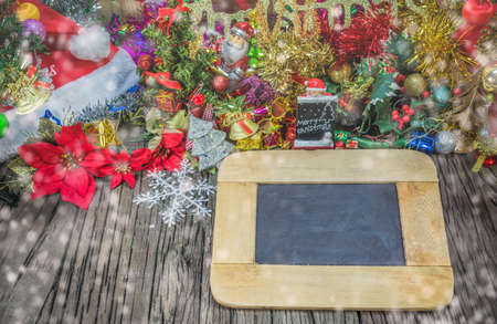 christmas ornaments and vary of decoration on wood background.の写真素材