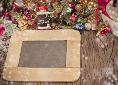 christmas ornaments and vary of decoration on wood background.の写真素材