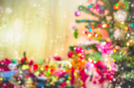 vintage tone blur image of christmas ornaments  and vary of decoration on wood background.の写真素材