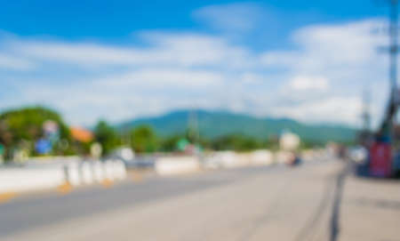 abstract  blur of the road with car on day time  for background usage.の写真素材