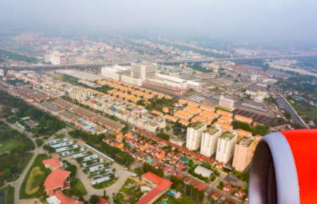 blur image of Bangkok City ,Thailand smog covering buildings on day timeの写真素材