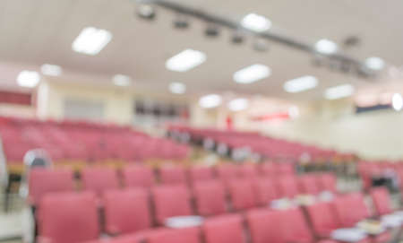 blurred image of empty auditorium room , Abstract blur for background usage.の写真素材