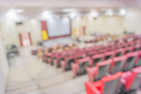 blurred image of empty auditorium room , Abstract blur for background usage.の写真素材