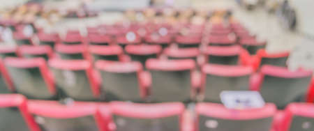 blurred image of empty auditorium room , Abstract blur for background usage.の写真素材