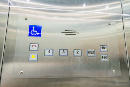 image of stainless steel elevator panel push buttons for blind and disability people
