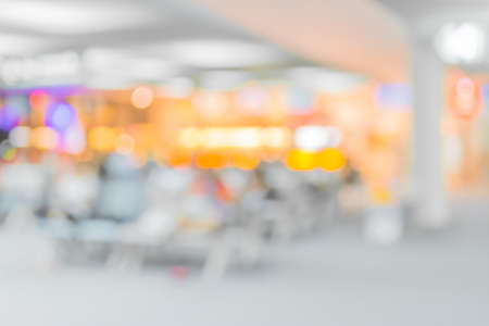 Blurred waiting chairs zone in airport or bus station,use as background.の写真素材